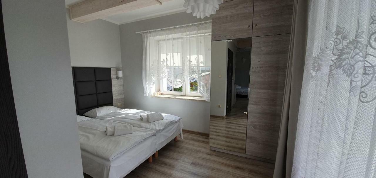 Apartamenty Pod Czyrna ชเจอร์ค ภายนอก รูปภาพ